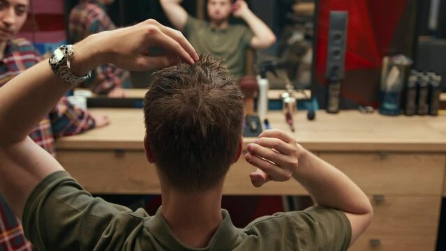 Barbershop: a male client tells what haircut he wants