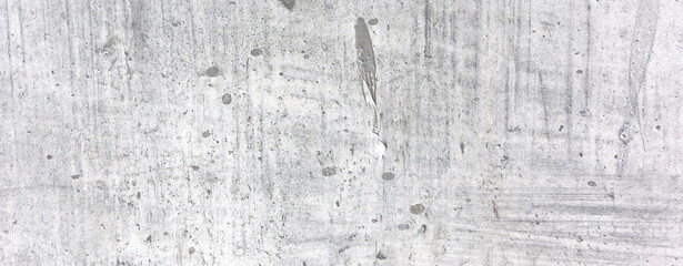Old dirty concrete wall as a background. Gray cement plaster. Wall texture for background. Brush scratches on the wall