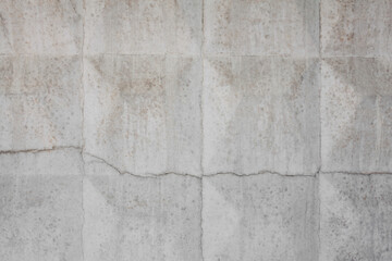 Dirty rough surface texture of sand screed cement, old gray concrete wall for background with uneven stains and tiny holes.