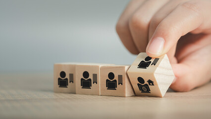 Hybrid workplace schedule, Gig economy, Freelance, Online business network communication, teamwork, home office concept. Hand flip wooden cube icon of gig economy, copy space for background or text.