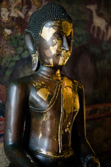 Buddha statue Wat Suthat Thep Wararam is a temple in Bangkok, Thailand, ancient architecture, cultural identity.