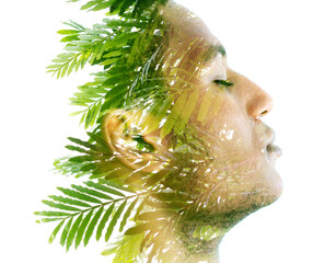Profile portrait of a man combined with an image of tropical plants