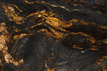 Obraz na płótnie Canvas Kosmus gold lether - natural granite stone texture, photo of slab.