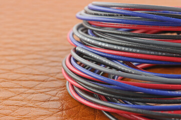 Copper wires in color insulation close-up.