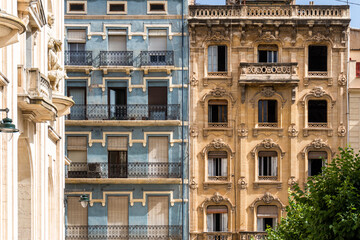 Colorful facades of nineteenth-century buildings, in Alcoy (Alicante, Spain), on a sunny morning.