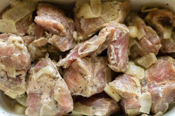 Meat to kebab. Marinating barbecue meat