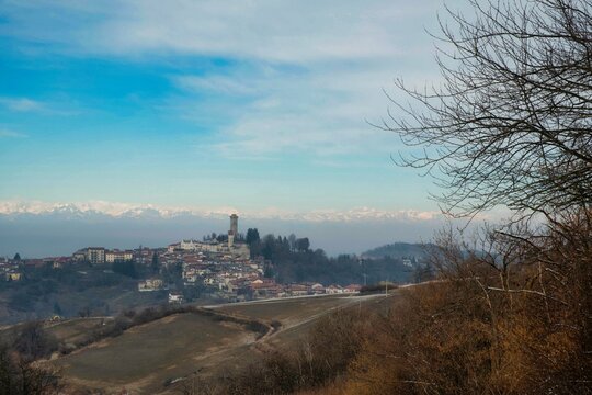 the village of Murazzano with its medieval tower in the Piedmontese Langhe, on a spring morning in 2022