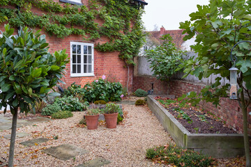 Landscaped garden in autumn, UK