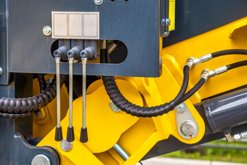Hydraulic system control levers on the excavator