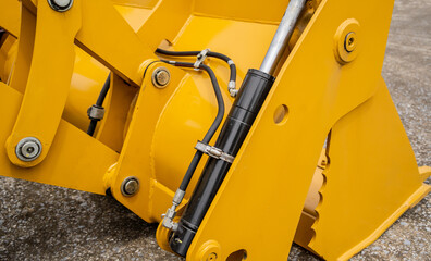 Details of hydraulicheavy duty equipment vehicle on display area of dealership
