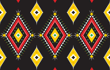 Geometric ethnic pattern design. Decorate the pattern with yellow, green, orange, black and white on a black background. Design for background, wallpaper, clothing, fabric. Vector illustration.