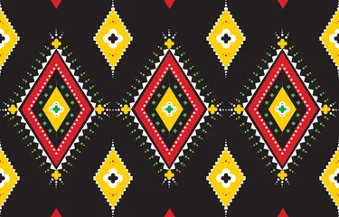 Stickers  Geometric ethnic pattern design. Decorate the pattern with yellow, green, orange, black and white on a black background. Design for background, wallpaper, clothing, fabric. Vector illustration.  © Aesoh