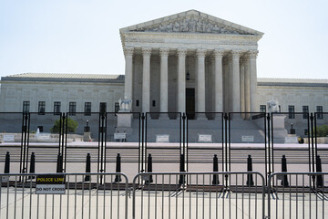Security fencing surrounds the U.S. Supreme Court building on Capitol Hill in Washington, DC.