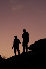 Fototapeta na wymiar silhouette of a family at sunset