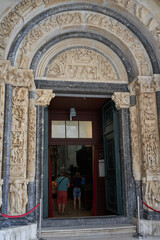 Fototapeta na wymiar Trogir, Croatia - May 28, 2022- the Cathedral of St. Lawrence - entrance detail