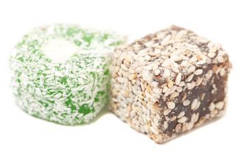 Cubes of traditional oriental sweets isolated on white background
