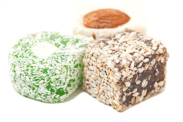 Cubes of traditional oriental sweets isolated on white background