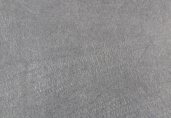 Gray background with scratched texture.