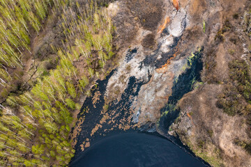 The ecosystem of the river was destroyed by harmful emissions from the mining and processing plant.
