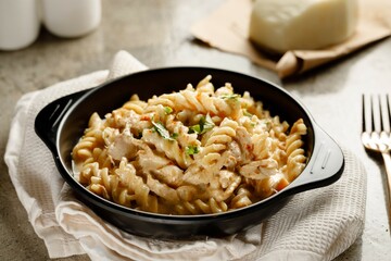 White pasta served in a dish isolated on grey background side view fast food