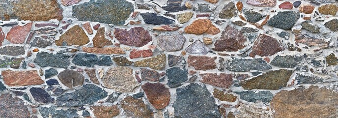 Panele Szklane  close up of a mosaic of a stone wall