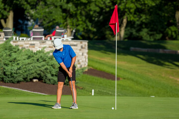 Junior golf on a beautiful day on the course