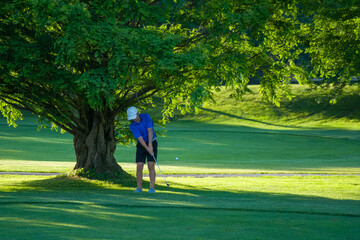 Junior golf on a beautiful day on the course