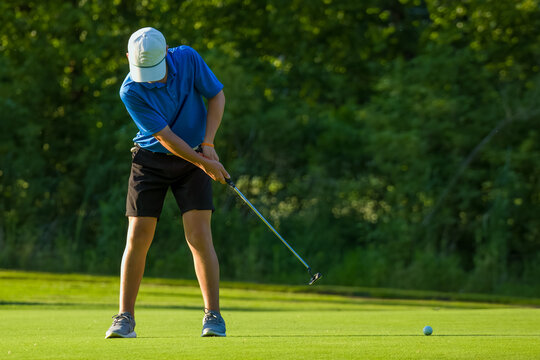 Junior golf on a beautiful day on the course