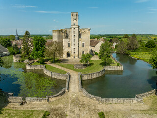Aerial panning view of Sagonne castle in France with inner complex surrounded by an outer wall...