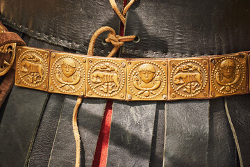 Ancient Roman vintage leather warrior clothing and decorated belt. Reconstruction of military...