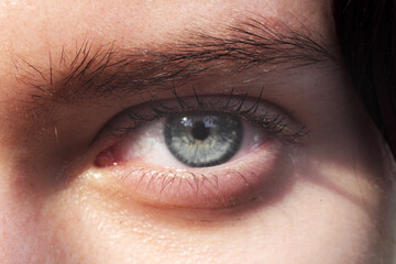 Eye of a young beautiful girl, close-up
