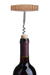 Opening bottle of wine with corkscrew on isolated background