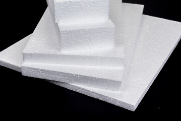 Stack of Polystyrene insulation boards. Polystyrene plates warehouse.