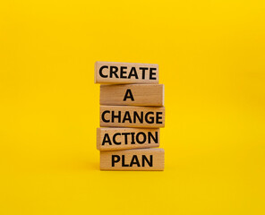 Create a change action plan symbol. Business Concept words Create a change action plan on wooden blocks. Beautiful yellow background. Business and Create a change action plan concept. Copy space