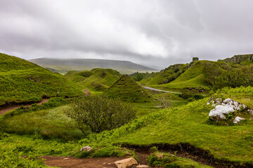 The Fairy Glen is located in the hills above the village of Uig on the Isle of Skye in Scotland. A strange landscape created by a landslip.