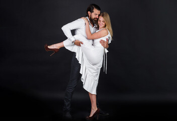 Romantic lovers couple dancing. Professional tango dancers. Ballroom dance. Passion and love.