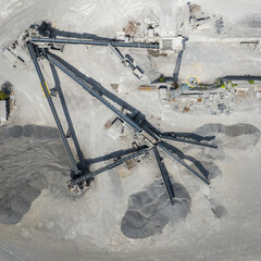 Sand and gravel sorting plant. Open sand and dolomite mine. Industrial conveyors. Aerial view of...