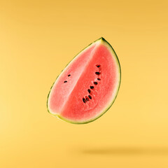 Fresh raw watermelon falling in the air isolated - obrazy, fototapety, plakaty