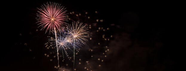 Fototapeta premium Fireworks celebrating the bonfires of San Juan in Alicante seen from the hotel melia, near the postiguet beach.