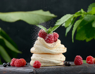 Baked cake made from whipped chicken protein and cream, decorated with fresh berries