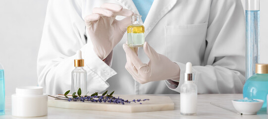 Beautician preparing natural cosmetics in laboratory