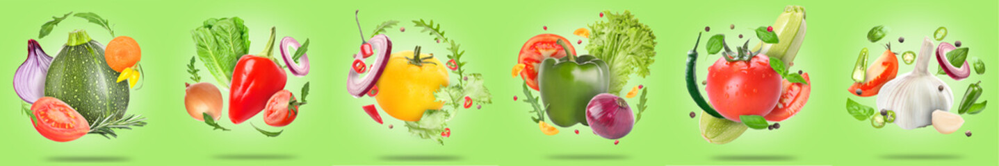 Set of flying fresh vegetables and herbs on green background