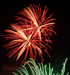 Playing with fireworks in the night sky