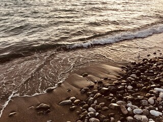 Beautiful wave texture on the seashore. Watercolour, multicolour textured background. Exotic island seaside banner. Sea waves with a lot of sea foam. Natural background for concept summer vacation. Na