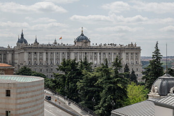 Fototapeta premium Panoramic image of the Royal Palace of Madrid on a cloudy and clear day