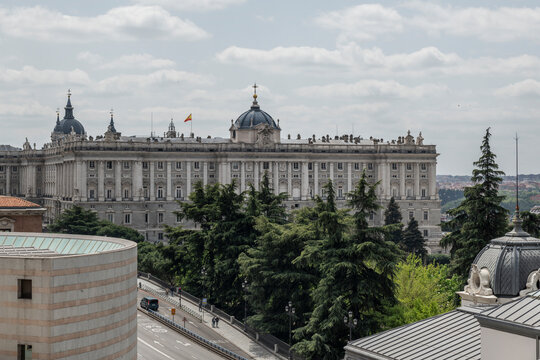 Panoramic image of the Royal Palace of Madrid on a cloudy and clear day