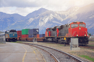 Passenger and freight container train in Jasper. Alberta.