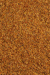 Bee pollen on a flat surface