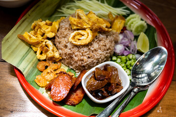 Close-up of shrimp paste fried rice on a zinc plate