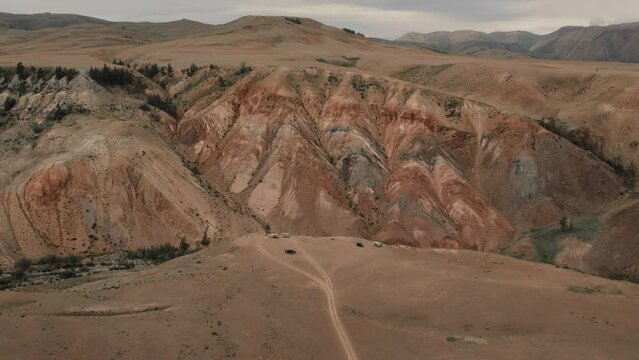 Kyzyl-Chin valley with red mountains also called as Mars valley in Altai, Siberia, Russia. Beautiful summer nature landscape at during daytime. Aerial view from a drone